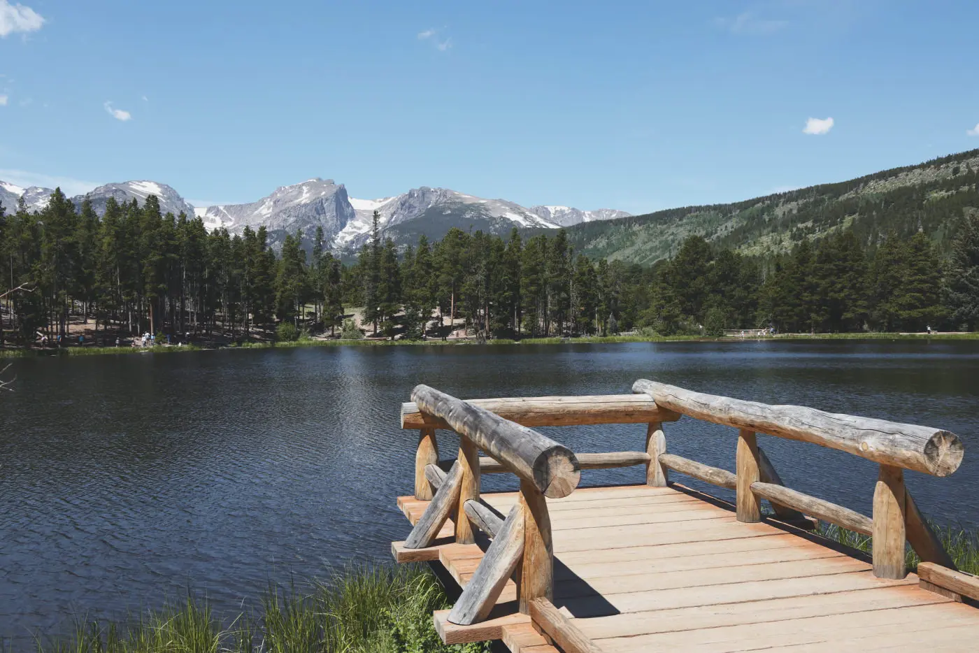 Mountain lake dock, in the Daily Chrome Filmic style